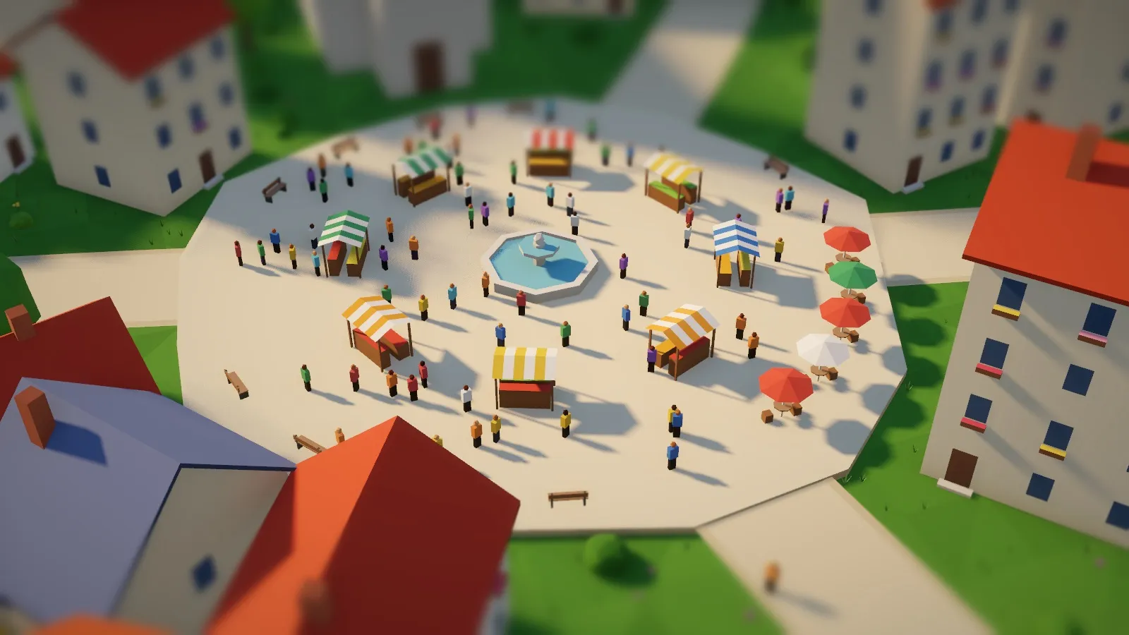 The market square up close: striped market stalls, a fountain, café umbrellas, benches and dozens of people